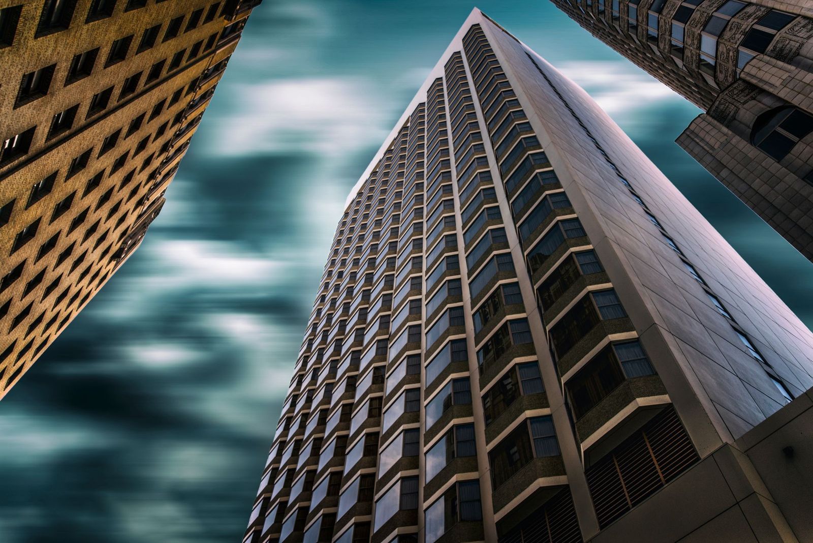 Downtown office towers seen looking straight up between buildings